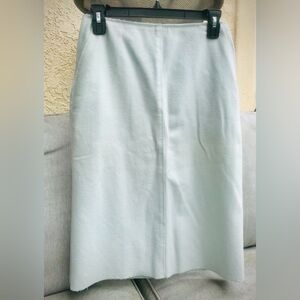 Pastel blue woolen skirt with pockets